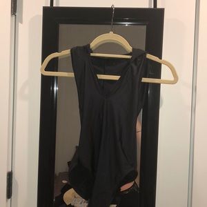 Backless, hooded body suit